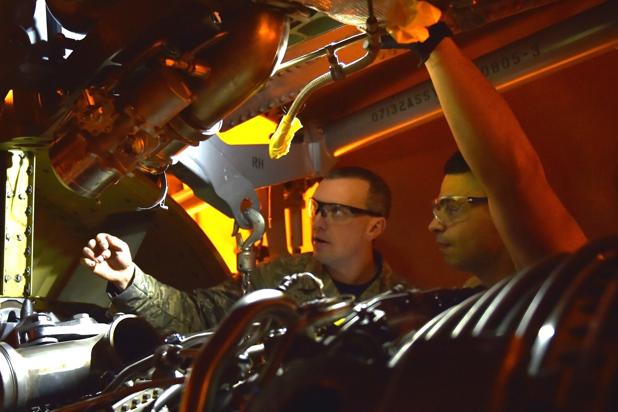 Master Sgt. Nathan Foxworth, 434th Maintenance Squadron propulsion flight chief, instructs Senior Airman Jesse Medrano 434th MXS propulsion specialist, as they prepare to install an engine in the wing of a KC-135R Stratotanker at Grissom Air Reserve Base, Indiana, Jan. 11, 2020. The 6,000 pound engine replaced another engine that showed signs of over temping and decreased performance. (U.S. Air Force photo/Tech. Sgt. Jami Lancette)