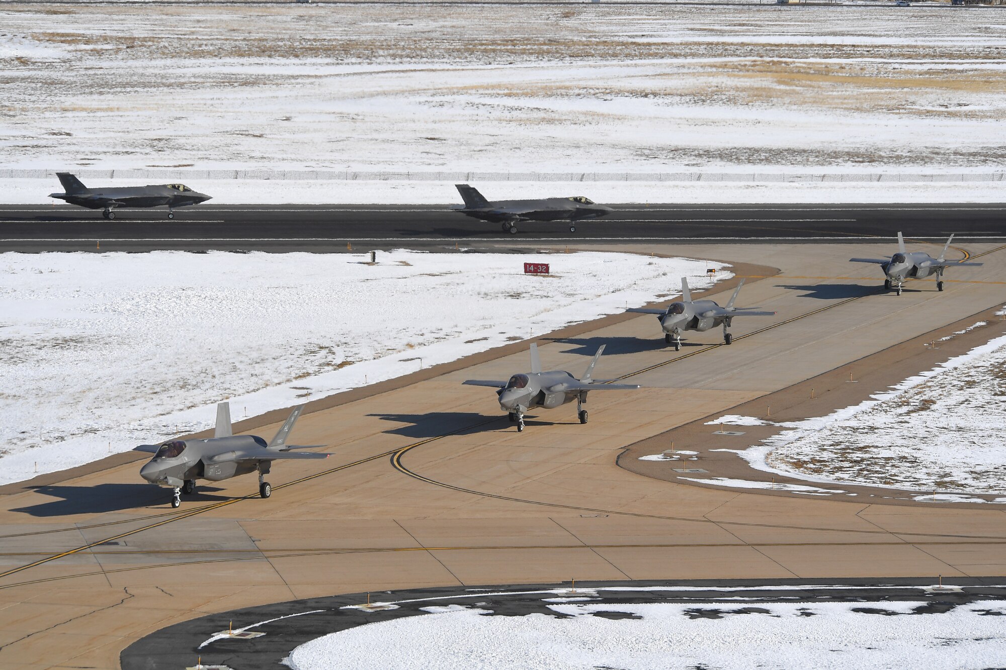 A photo of F-35As taxiing at Hill Air Force Base, Utah.