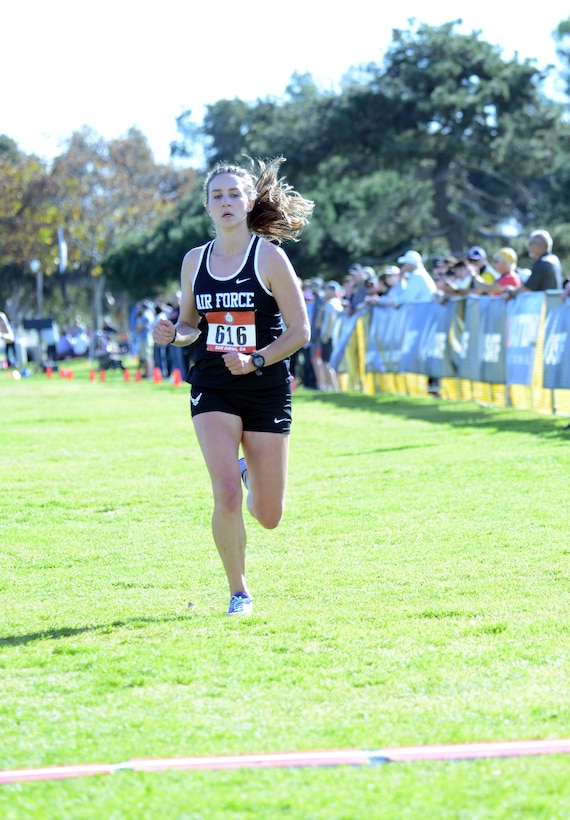 Air Force 2nd Lt. Carina Gillespie crosses the finish line at 38:57 to earn a silver medal in the Armed Forces Cross Country Championship at Misson Bay Park in San Diego, Calif., Jan. 18, 2020.