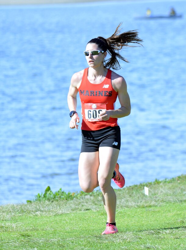 Marine Corps Capt. Lindsay Carrick of Quantico, Va., runs the second lap of the women's Armed Forces Cross Country Championship at Mission Bay Park in San Diego, Jan. 18, 2020. She took gold with a time of 38:10.