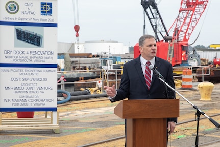 Participants in Norfolk Naval Shipyard’s Dry Dock 4 renovation groundbreaking Jan. 23 include, from left to right: Drew Quiroz, President, Asturian-Consigli JV; Stephanie Douglas, NAVSEA Director of Industrial Operations (SEA 04); John Rowe, Mayor, City of Portsmouth; Capt. Kai Torkelson, Commander, Norfolk Naval Shipyard; James Geurts, Assistant Secretary of the Navy (Research, Development and Acquisition); Congressman Robert “Bobby” Scott, 3rd District of Virginia; Cmdr. William Butler, NAVFAC Public Works Officer, Norfolk Naval Shipyard; Robert Fogel, Project Superintendent, Industrial Facilities and Equipment, Norfolk Naval Shipyard; and Stan Magann, Vice President, W.F. Magann Corporation.