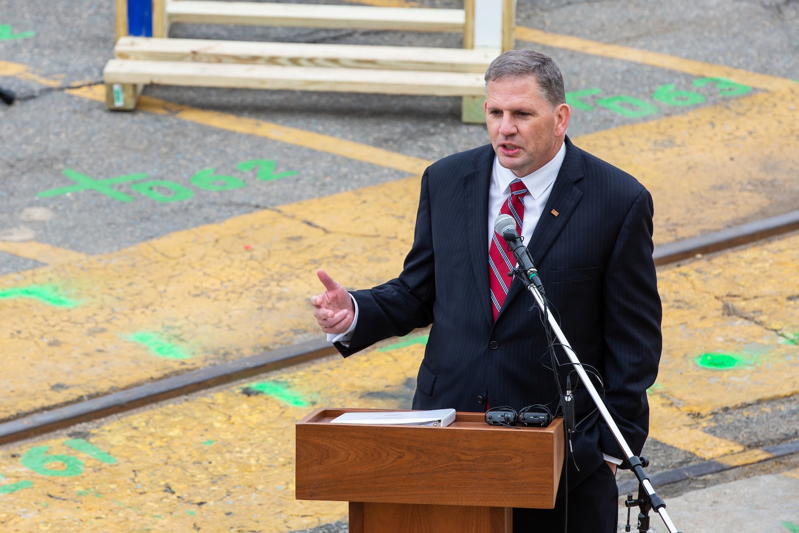 Participants in Norfolk Naval Shipyard’s Dry Dock 4 renovation groundbreaking Jan. 23 include, from left to right: Drew Quiroz, President, Asturian-Consigli JV; Stephanie Douglas, NAVSEA Director of Industrial Operations (SEA 04); John Rowe, Mayor, City of Portsmouth; Capt. Kai Torkelson, Commander, Norfolk Naval Shipyard; James Geurts, Assistant Secretary of the Navy (Research, Development and Acquisition); Congressman Robert “Bobby” Scott, 3rd District of Virginia; Cmdr. William Butler, NAVFAC Public Works Officer, Norfolk Naval Shipyard; Robert Fogel, Project Superintendent, Industrial Facilities and Equipment, Norfolk Naval Shipyard; and Stan Magann, Vice President, W.F. Magann Corporation.