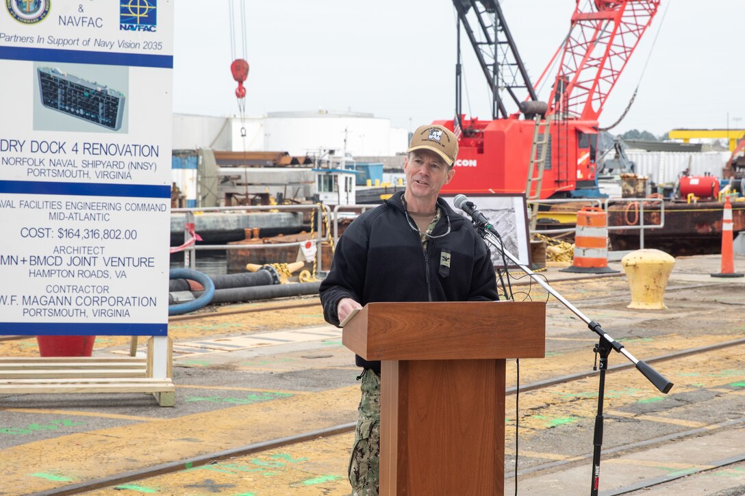 Norfolk Naval Shipyard Commander Capt. Kai Torkelson speaks on the history of Norfolk Naval Shipyard’s Dry Dock 4 at its renovation groundbreaking Jan. 23.