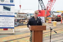 Norfolk Naval Shipyard Commander Capt. Kai Torkelson speaks on the history of Norfolk Naval Shipyard’s Dry Dock 4 at its renovation groundbreaking Jan. 23.