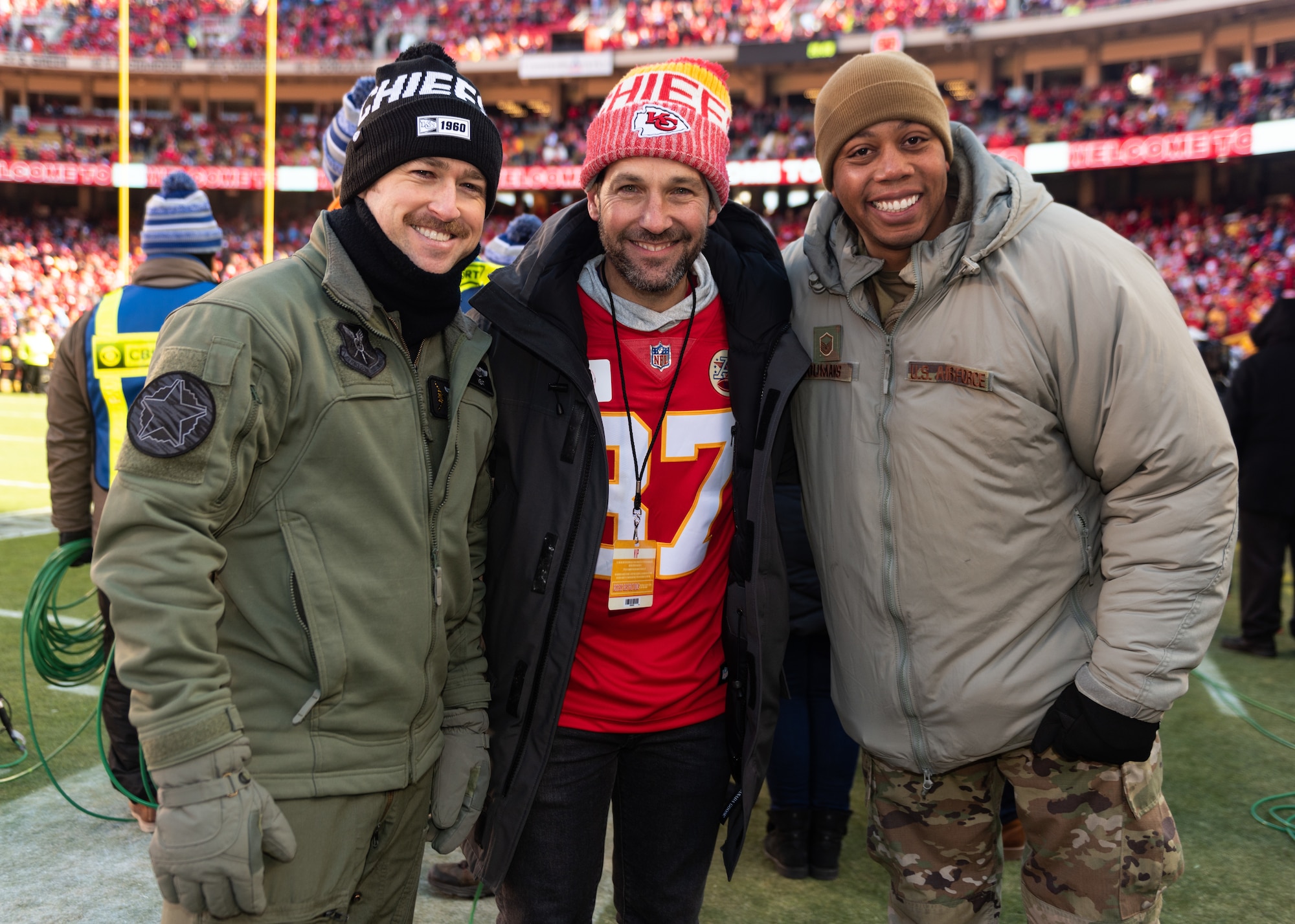 Airmen assigned to the 509th Bomb Wing and the 131st Bomb Wing at Whiteman Air Force Base, Missouri, stand with actor Paul Rudd before the AFC Championship game on Jan. 19, 2020, at Arrowhead Stadium, Kansas City, Missouri. Rudd has appeared in movies such as Ant Man, Guardians of the Galaxy and Living With Yourself. He is a Kansas City native and was the Spirit Leader in charge of hitting the ceremonial drum used to hype the crowd up during the game. Before the game a B-2 Spirit Stealth Bomber from Whiteman AFB ﬂew over stadium and during the third quarter the Kansas City Chiefs recognized Airmen for coordinating the ground work for the ﬂyover. (U.S. Air Force photo by Senior Airman Thomas Barley)