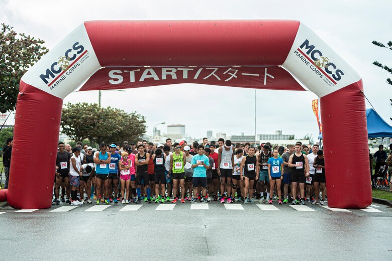 Participants in the Kinser Half-Marathon wait for the start of the event on Jan. 12, 2020 at Camp Kinser, Okinawa, Japan.