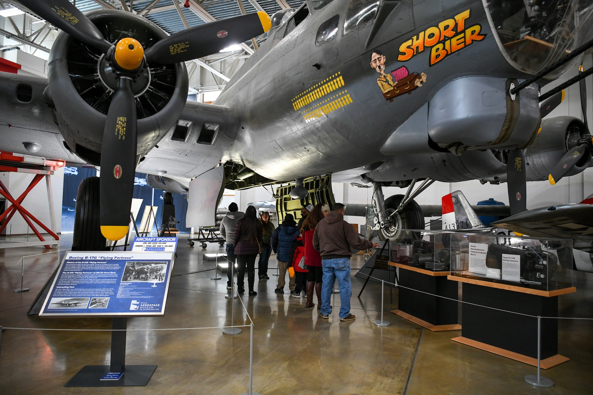 Visitors look up into the fuselage of the Hill Aerospace Museum’s Boeing B-17G Dec. 20, 2019, at Hill Air Force Base, Utah. The museum recently celebrated its 5 millionth visitor in November 2019. (U.S. Air Force photo by Cynthia Griggs)