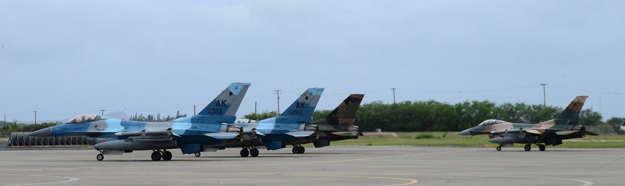 F-16 Fighting Falcons, assigned to the 18th Aggressor Squadron, stage prior to take-off during Sentry Aloha 20-1 on Joint Base Pearl Harbor-Hickam, Jan. 14, 2020. This iteration of the exercise involves approximately 1,000 personnel and 35 aircraft from 11 states. (U.S. Air Force photo by Staff Sgt. Sean Martin)