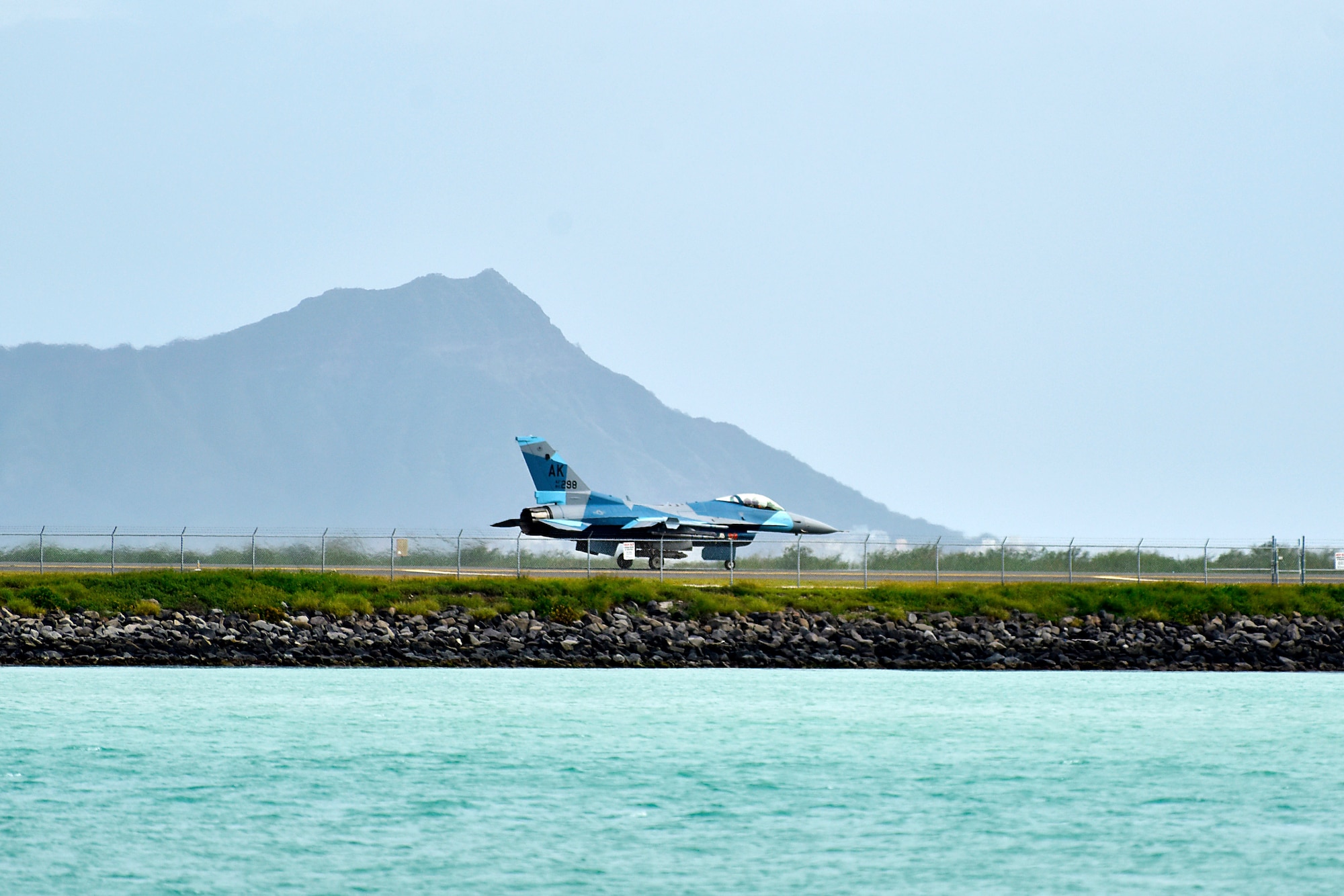 An F-16 Fighting Falcon assigned to the 18th Aggressor Squadron taxis down the runway during Sentry Aloha 20-1 at Joint Base Pearl Harbor-Hickam, Hawaii, Jan. 15, 2020. The 18th AGRS utilizes mobile training teams to train U.S. Air Force, Air National Guard and joint partner nations in different environments, to include arctic, desert and tropical locations. (U.S. Air Force photo by Senior Airman Beaux Hebert)