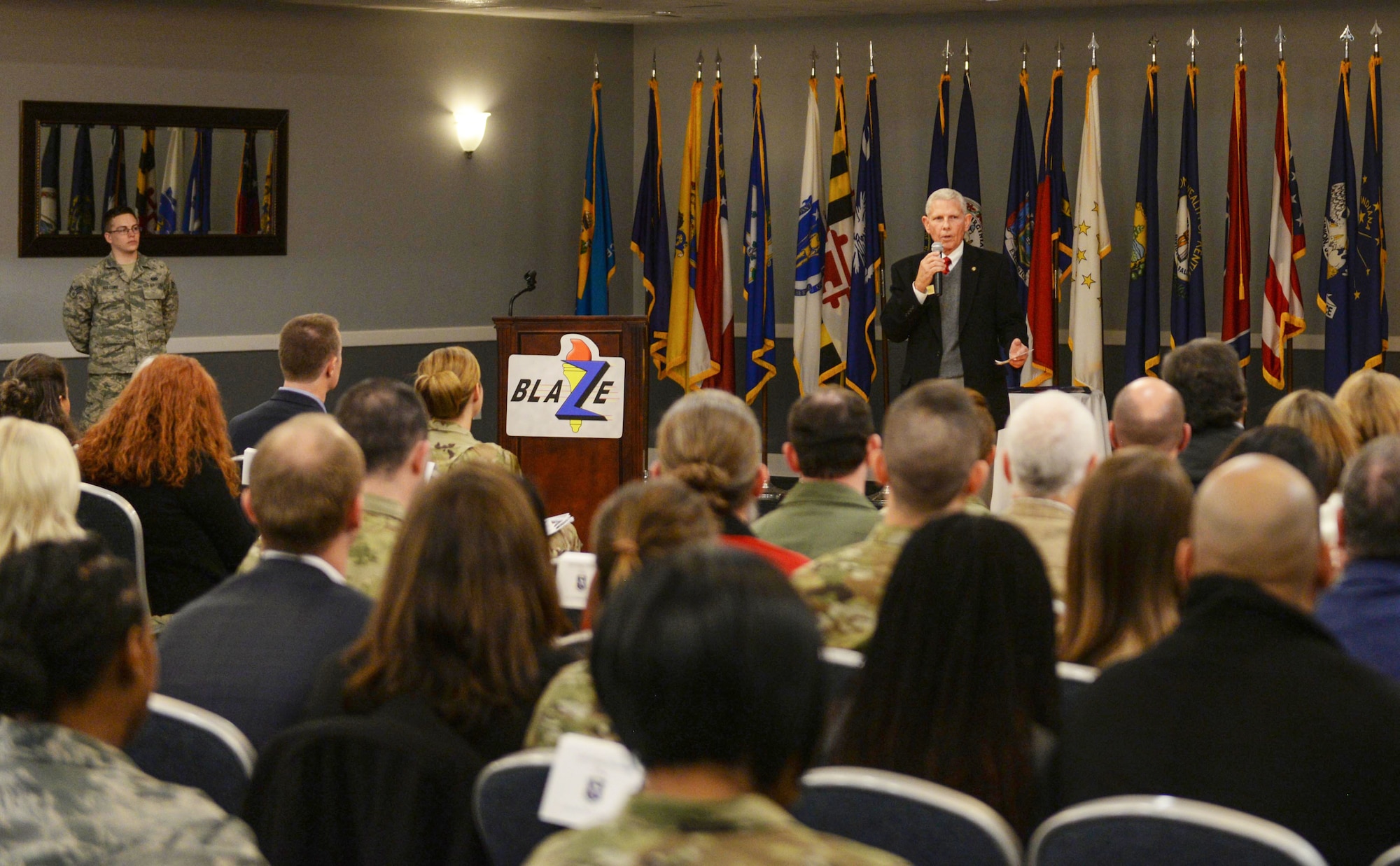 Retired Marine Corps Maj. Gen. Thomas Moore  speaks to those in attendance at the Honorary Commander Induction Ceremony Jan. 21, 2020, at Columbus Air Force Base, Miss. Moore was commissioned as a second lieutenant in the Marine Corps in 1973 through Officer Candidate School in Quantico, Va., and has lived in Columbus since 2008. (U.S. Air Force photo by Airman Davis Donaldson)