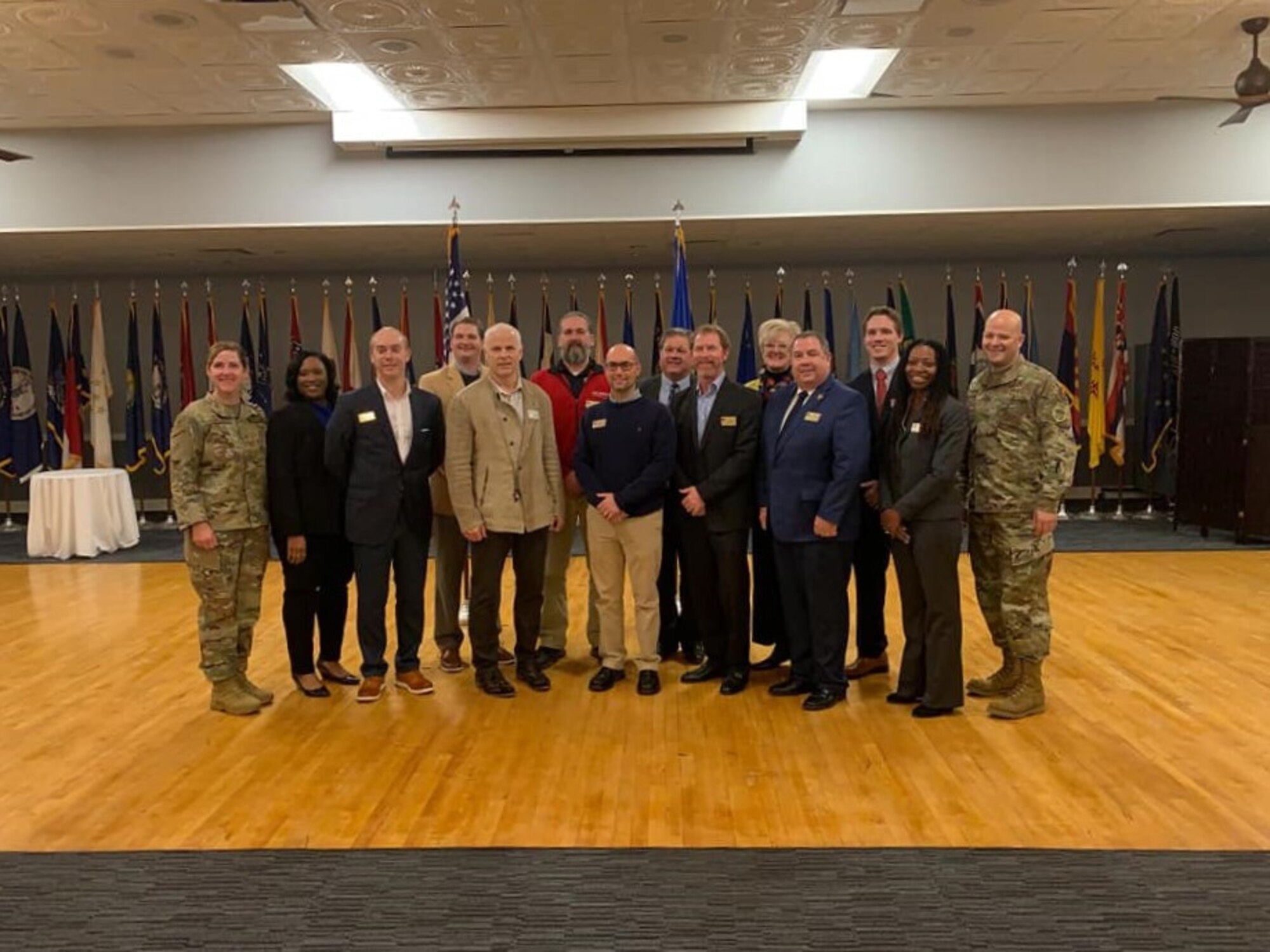 Col. Samantha Weeks (far left), 14th Flying Training Wing commander, and Chief Master Sgt. Trevor James (far right), 14th FTW command chief, stand with new honorary commanders following the Honorary Commander Induction Ceremony Jan. 21, 2020, at Columbus Air Force Base, Miss. The program connects the base and the community in a more intimate and personal way, forming relationships that allow both entities to learn and grow together. (U.S. Air Force photo by Airman Davis Donaldson)