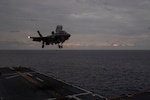 EAST CHINA SEA (Jan. 19, 2020) An F-35B Lightning II assigned to the 31st Marine Expeditionary Unit (MEU), Marine Medium Tiltrotor Squadron (VMM) 265 (Reinforced) lands on the flight deck of amphibious assault ship USS America (LHA 6). America, flagship of the America Expeditionary Strike Group, 31st MEU team, is operating in the U.S. 7th Fleet area of operations to enhance interoperability with allies and partners and serve as a ready response force to defend peace and stability in the Indo-Pacific region.