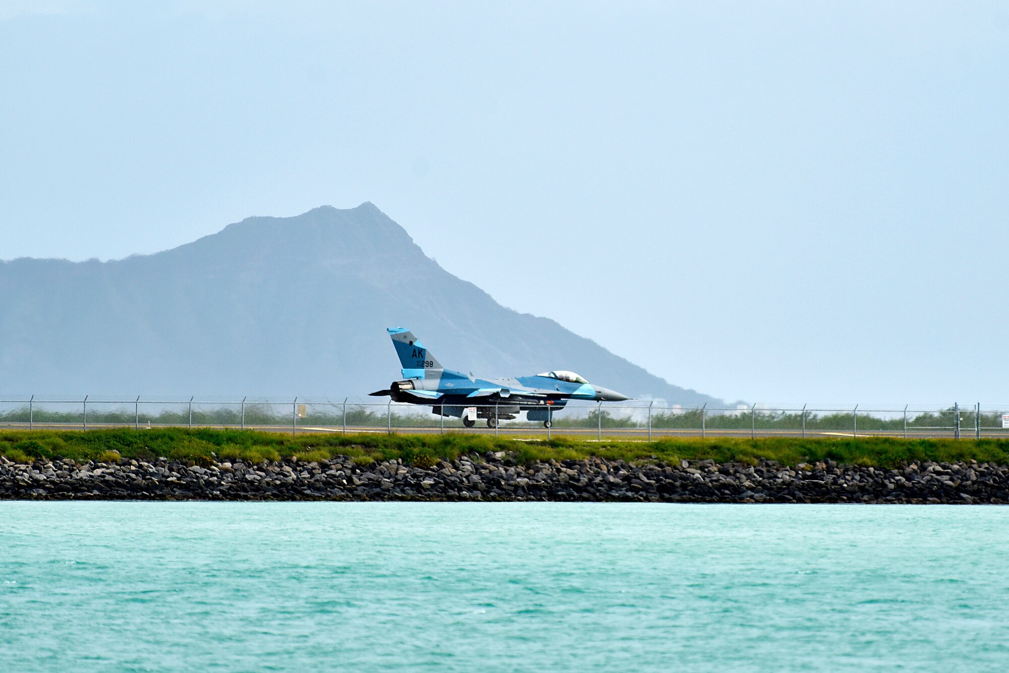 An F-16 Fighting Falcon assigned to the 18th Aggressor Squadron taxis down the runway during Sentry Aloha 20-1 at Joint Base Pearl Harbor-Hickam, Hawaii, Jan. 15, 2020. The 18th AGRS utilizes mobile training teams to train U.S. Air Force, Air National Guard and joint partner nations in different environments, to include arctic, desert and tropical locations. (U.S. Air Force photo by Senior Airman Beaux Hebert)