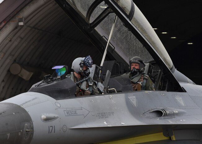 U.S. Air Force Col. Jack Fischer, 50th Space Wing vice commander, and Capt. Andy Marty, 80th Fighter Squadron pilot prepare for takeoff in an F-16 Fighting Falcon aircraft at Kunsan Air Base, Republic of Korea, Jan. 22, 2020. Fischer served nine years as an astronaut, including a 2017 mission to the International Space Station. (U.S. Air Force photo by Staff Sgt. Anthony Hetlage)