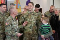 U.S. Army Chief of Chaplains, Chaplain (Maj. Gen.) Thomas L. Solhjem, speaks to newly appointed U.S. Army Reserve Chaplain (1st Lt.) Gabriel Pech, 7th Mission Support Command, before he receives the Army Chaplain cross during a pinning ceremony held at the Daenner Kaserne Chapel in Kaiserslautern, Germany on January 22, 2020. Pech was the first U.S. Army Reserve officer to complete the Chaplain Candidate Program in Europe.