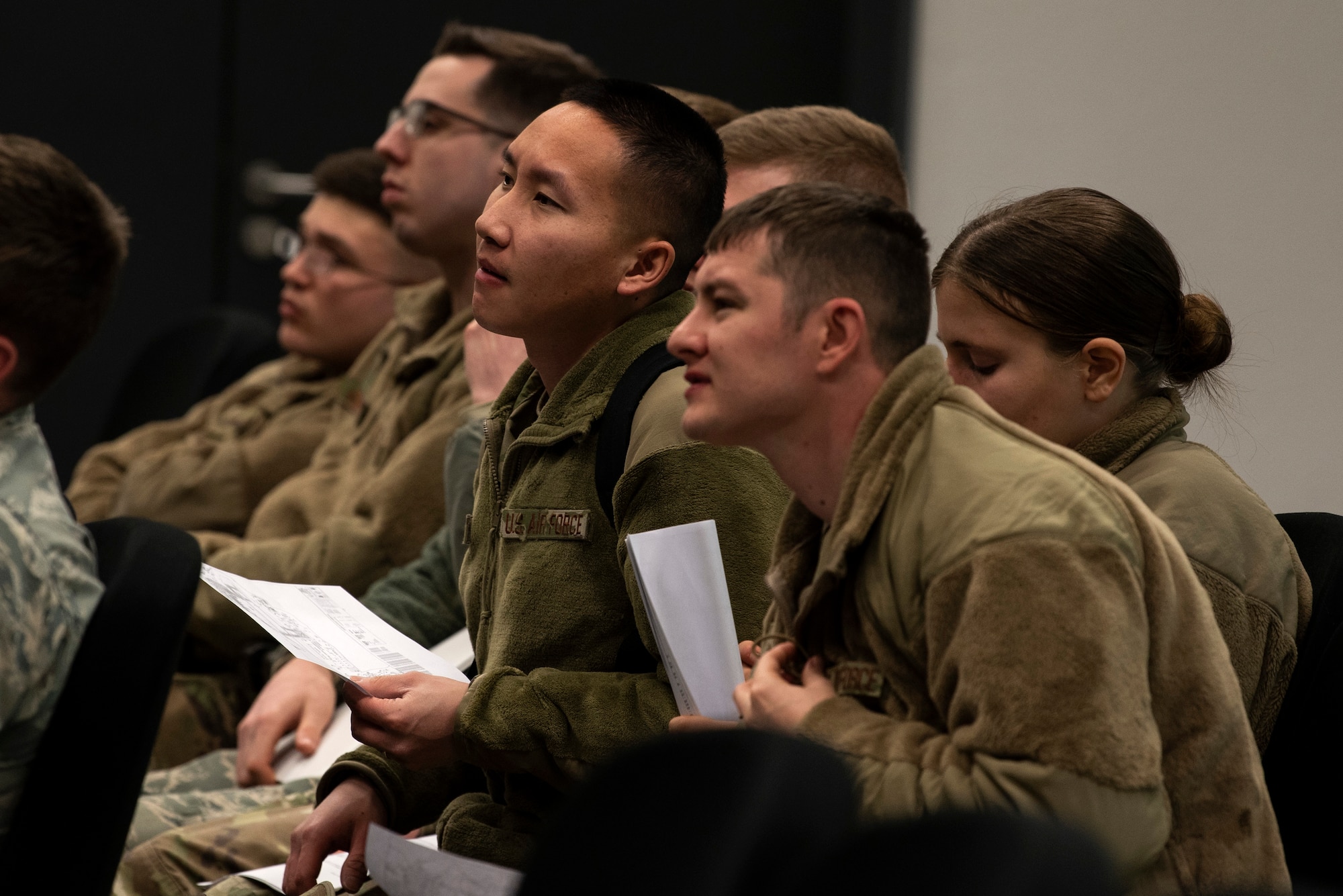 U.S. Air Force Airmen from the 52nd Logistics Readiness Squadron listen to a briefing at Ramstein Air Base, Germany, Jan. 22, 2020. Different units from the 52nd Fighter Wing participated in an Agile Combat Employment exercise to practice generating combat airpower in a deployed environment. 52nd LRS Airmen obtained training needed to drive on Ramstein's flightline. (U.S. Air Force photo by Airman 1st Class Valerie Seelye)
