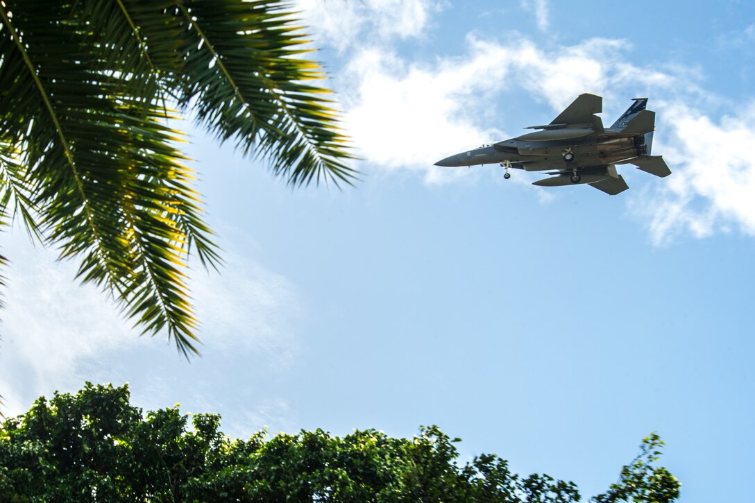 A California Air National Guard  F-15C Eagle, assigned to the 194th Fighter Squadron, approaches Honolulu Airport for landing Jan. 17, 2020, during exercise Sentry Aloha 20-1. Sentry Aloha provides cost-effective, tailored and realistic combat training for aviators across the U.S., providing them with the skills necessary to perform their homeland defense and overseas combat missions.  (U.S. Air National Guard photo by Senior Airman John Linzmeier)