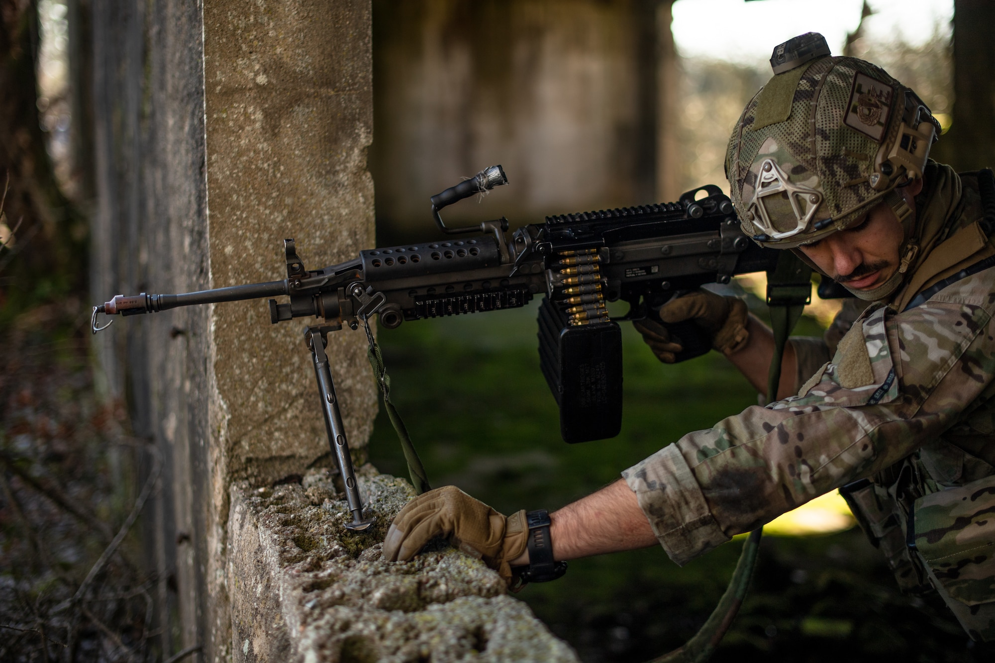 U.S. Air Force Staff Sgt. Dwight Stalter, 435th Security Forces Squadron contingency response team leader, mounts his rifle to a concrete window during exercise Frozen Defender in Grostenquin, France, Jan. 16, 2020. The exercise was designed to sharpen defenders’ skills when faced with unpredictable circumstances. (U.S. Air Force photo by Staff Sgt. Devin Boyer)