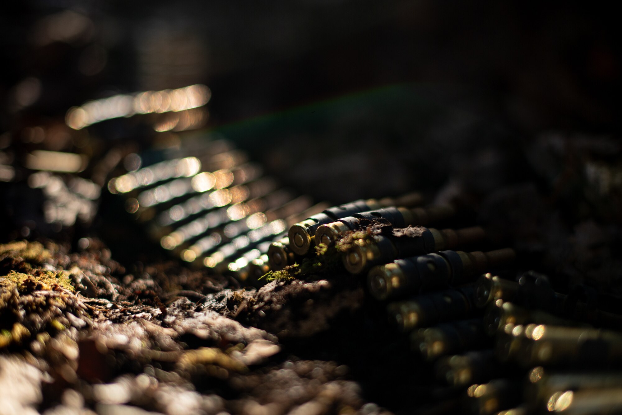 A belt of 7.62 mm blank rounds lies on top of rubble in Grostenquin, France, Jan. 16, 2020. The use of blank rounds added to the realism of Frozen Defender, an exercise designed to test the 435th Security Forces Squadron’s capabilities in a contested environment under harsh conditions. (U.S. Air Force photo by Staff Sgt. Devin Boyer)