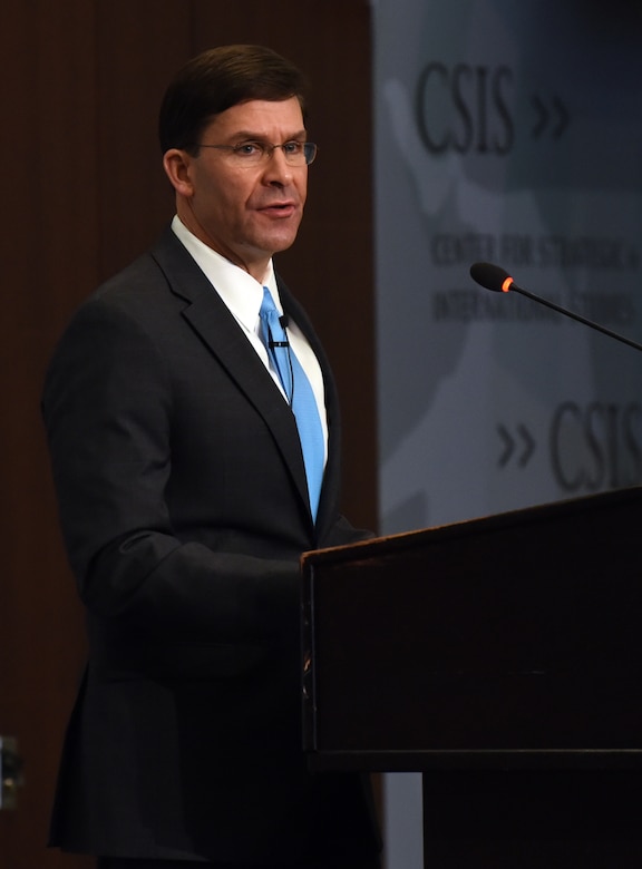 Defense Secretary Dr. Mark T. Esper speaks from behind a podium.