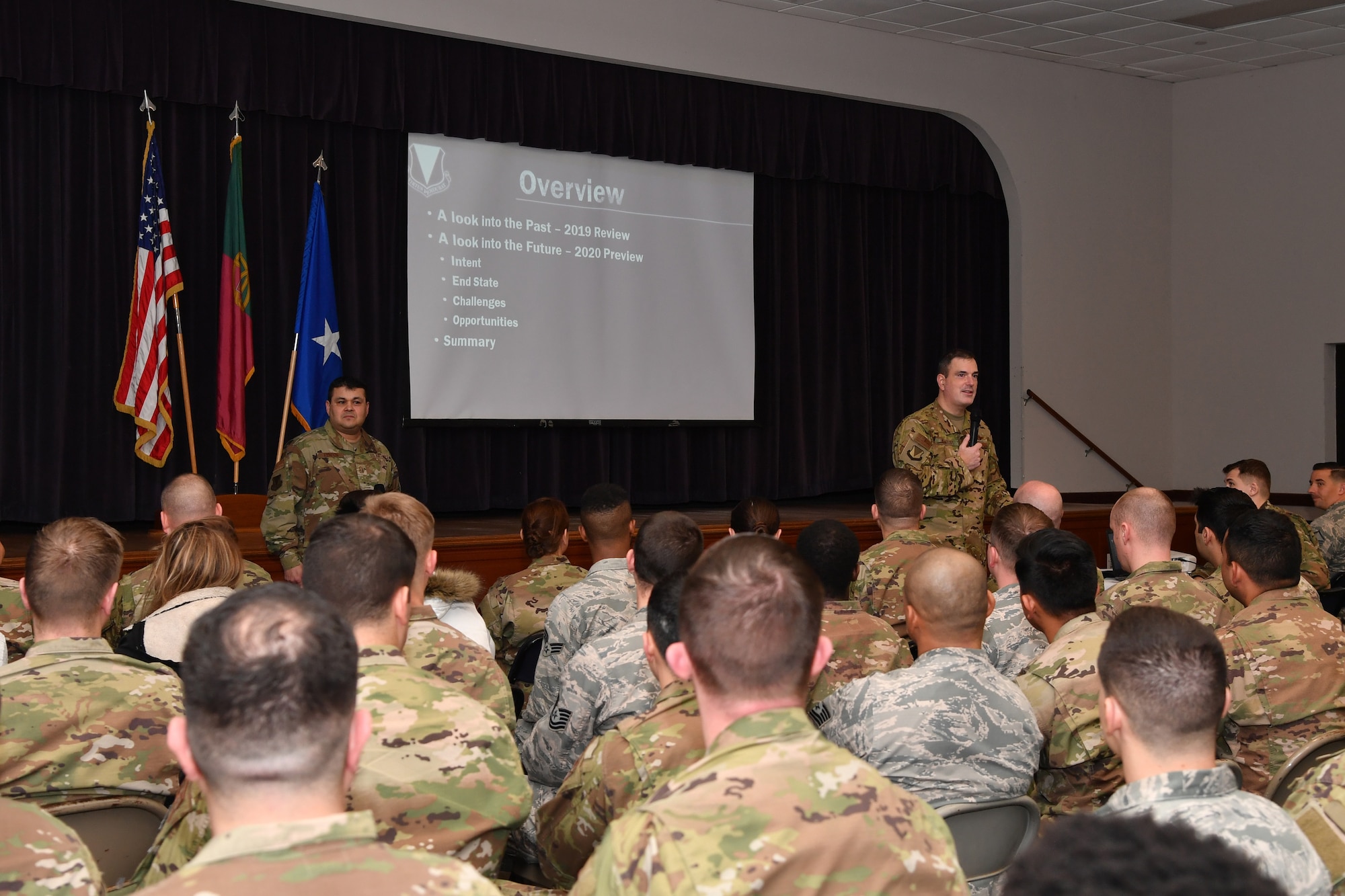 U.S. Air Force Brig. Gen. Mark R. August, 86th Airlift Wing commander, right, and U.S. Air Force Chief Master Sgt. Ernesto J. Rendon, 86th AW command chief, speak to Airmen from the 65th Air Base Group at Lajes Field, Portugal, Jan. 21, 2020.