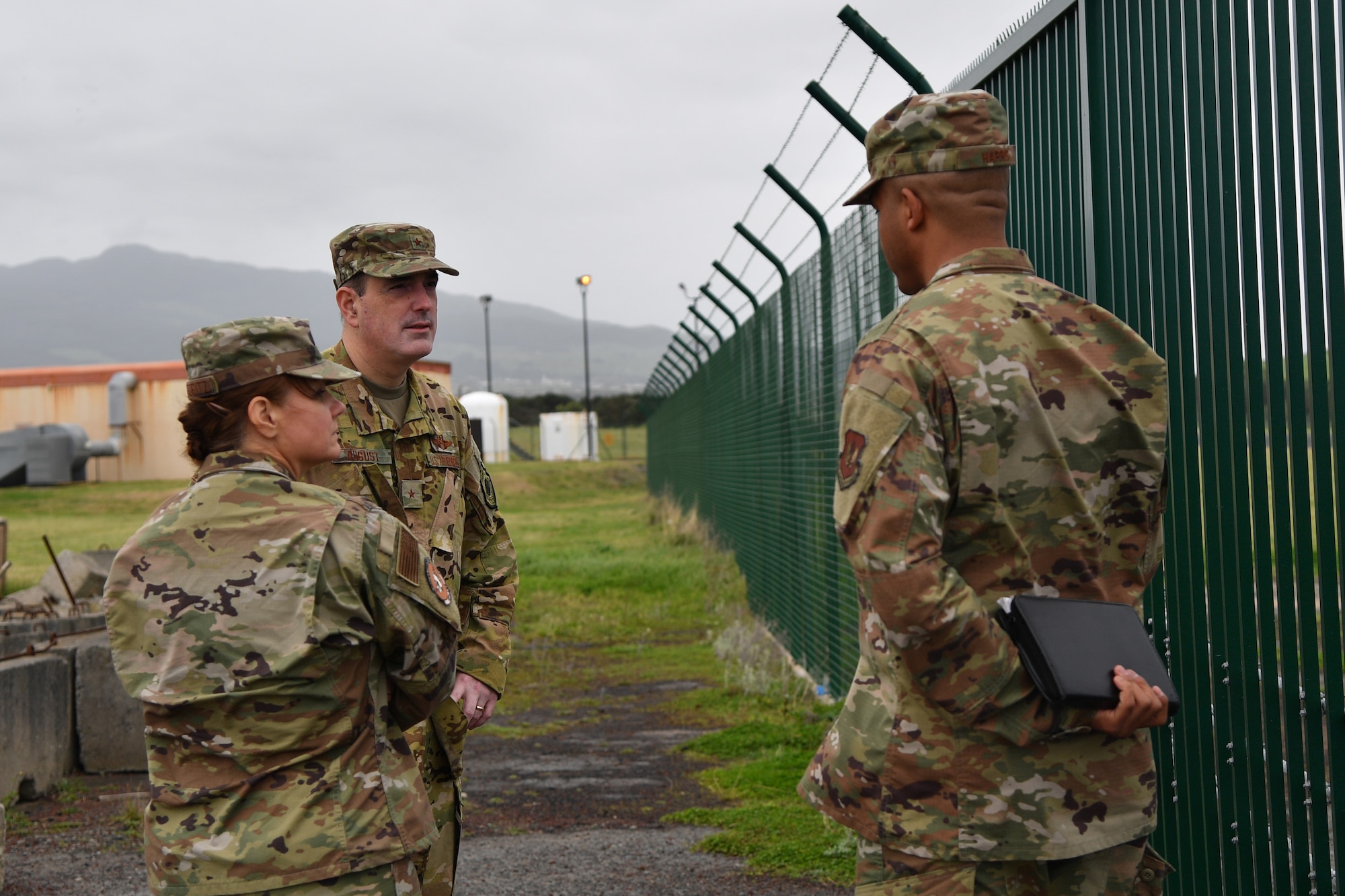 U.S. Air Force Brig. Gen. Mark R. August, 86th Airlift Wing commander, center, meets with U.S. Air Force Col. Beth D. Graboritz, 65th Air Base Group commander, and U.S. Air Force Maj. Loren Jones-Harris, 65th Civil Engineer Squadron commander, after an all-call to view an updated landing strip and anti-vehicle barrier on Lajes Field, Portugal, Jan. 21, 2020.