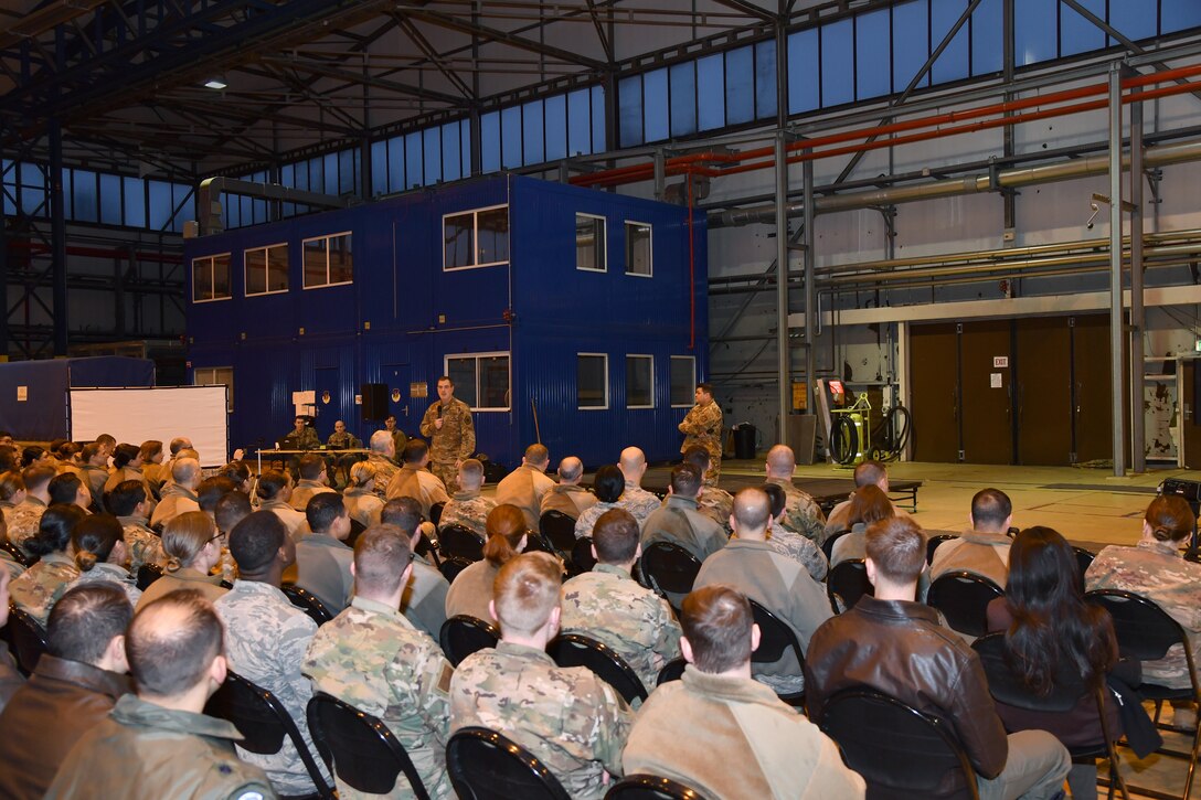 U.S. Air Force Brig. Gen. Mark R. August, 86th Airlift Wing commander, left, and U.S. Air Force Chief Master Sgt. Ernesto J. Rendon, 86th AW command chief, speak to Airmen during an all-call at Ramstein Air Base, Germany, Jan. 23, 2020.