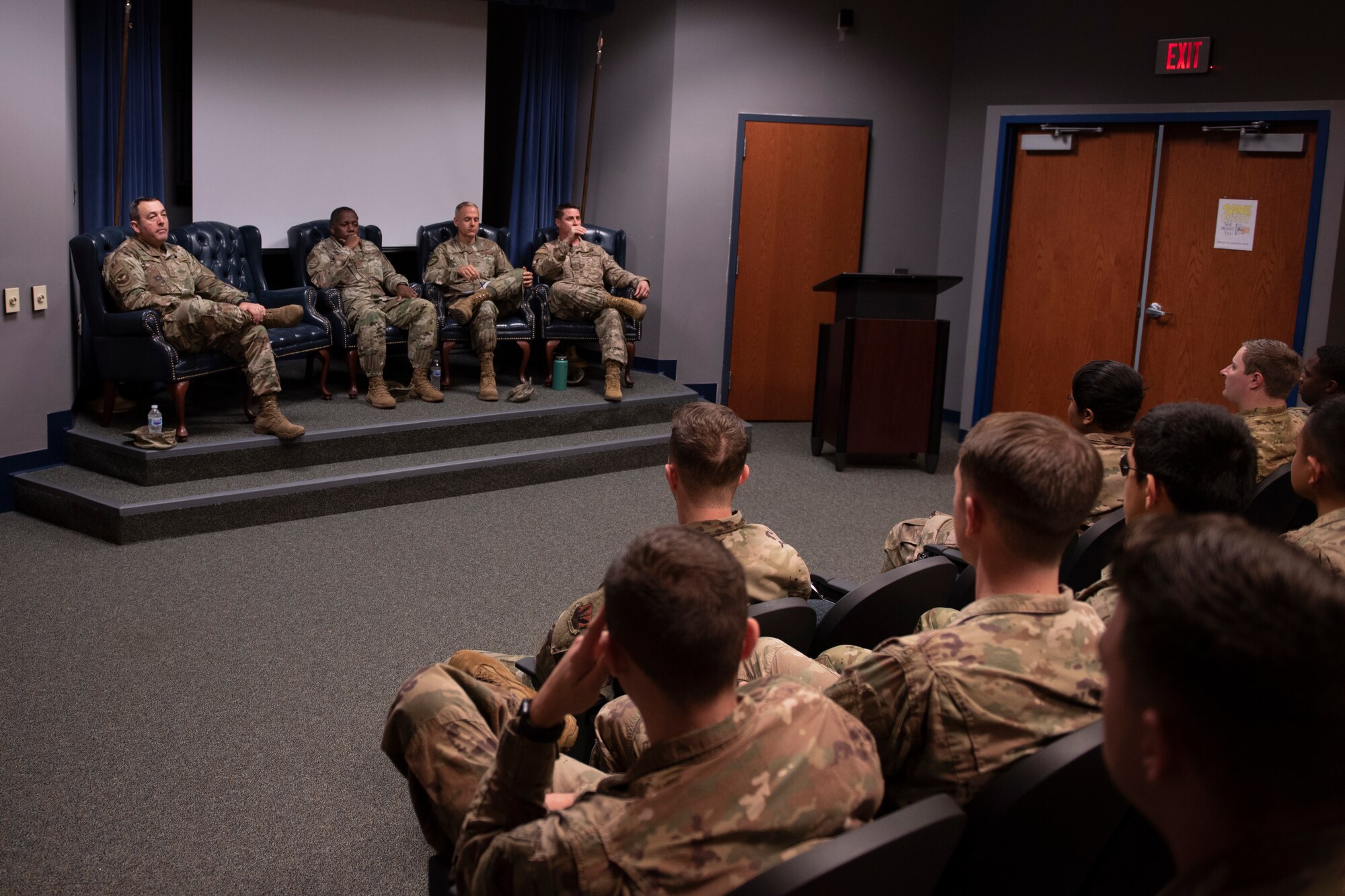A photo of an Airman asking a question during the Airman Leadership School Class 20-B's Chief Panel.