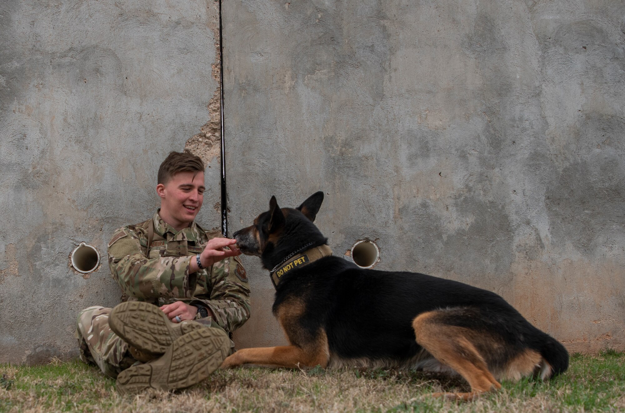 Military working dog handler, and MWD Fix, take a break