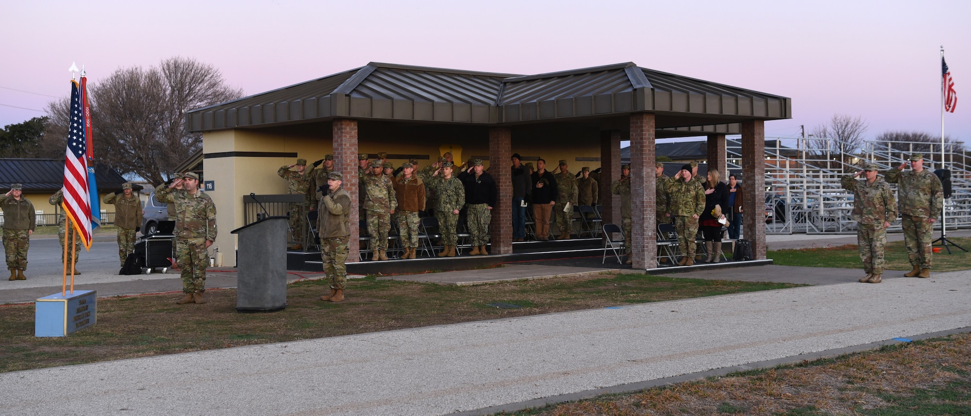 U.S. Army Staff Sgt. Jordon Valderaz, 344th Military Intelligence Battalion Alpha Company orderly room Noncommissioned Officer in Charge, sings the National Anthem at the Activation Ceremony and Assumption of Command of the Charlie Company on the parade field at Goodfellow Air Force Base, Texas, Jan. 24, 2019.  The National Anthem is sang before special events to honor and pay respects to the United States of America. (U.S. Air Force photo by Airman 1st Class Abbey Rieves)