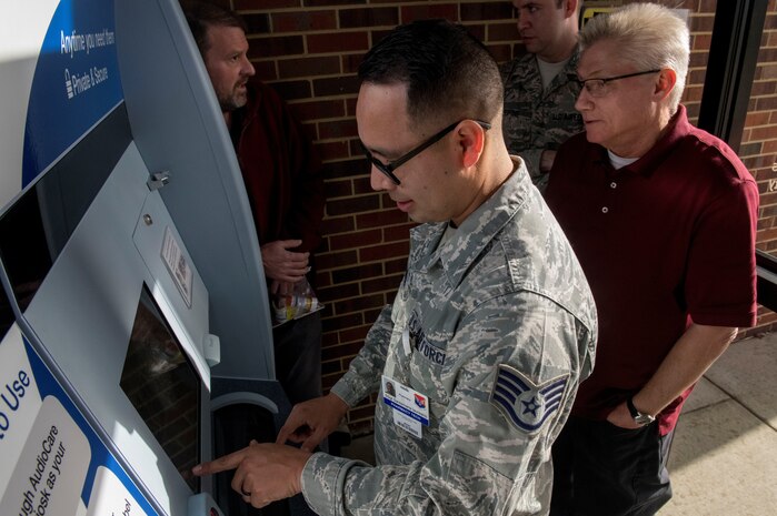 Staff Sgt. Pablo Santamaria, a pharmacy technician assigned to the 628th Medical Support Squadron, learns how to load prescriptions into the new ScriptCenter machine in the 628th Medical Group Pharmacy, January 21, 2019, at Joint Base Charleston. The ScriptCenter provides 24 hour access to prescriptions for patients.