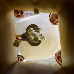 Airmen assigned to the Ohio National Guard’s 180th Fighter Wing Traffic Management Office (TMO) fill a box with packing peanuts Jan. 12, 2020. The TMO processes and manages moving cargo, shipments and Airmen around the world and receives supplies for the base, ensuring the Air Force can fulfill its mission.