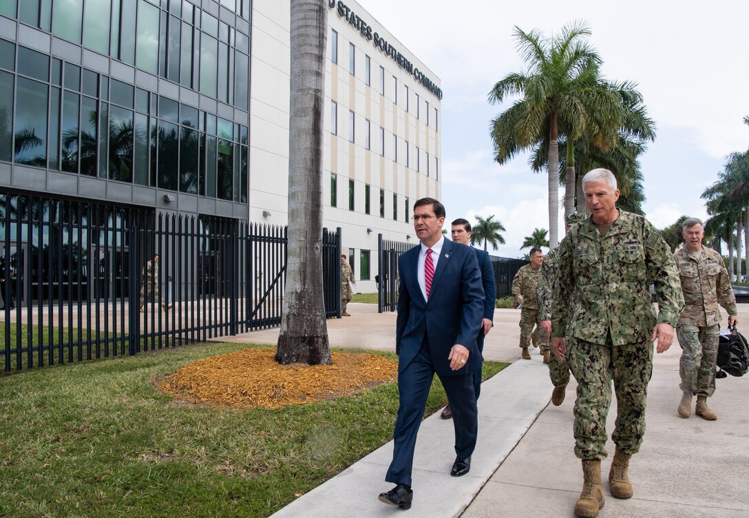 Defense Secretary Dr. Mark T. Esper walks with SOUTHCOM commander Adm. Craig S. Faller during his visit to the SOUTHCOM Headquarterss, in Doral, Fl., Jan. 23, 2020.