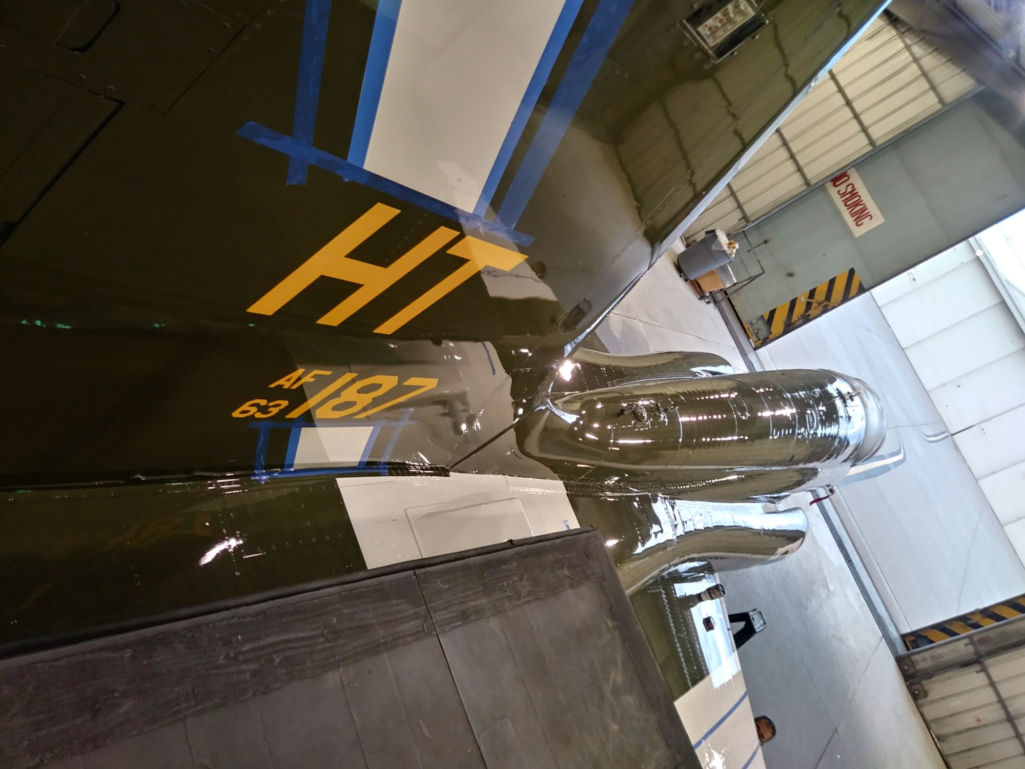 A T-38 Talon assigned to the 586th Flight Test Squadron sits in the paint barn being adorned with WW II namesake markings. The 586th Flight Test Squadron is repainting this T-38 in honor of their World War II namesake, the 586th Bombardment Squadron. (U.S. Air Force photo by Dwight Harp)