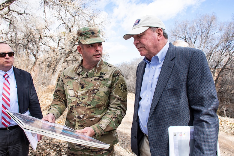 Albuquerque, N.M. -- Lt. Col. Dale Caswell, commander, U.S. Army Corps of Engineers-Albuquerque District, briefs a civil works levee project to R.D. James, assistant secretary of the Army for civil works, during James' visit to the district, Jan. 22.