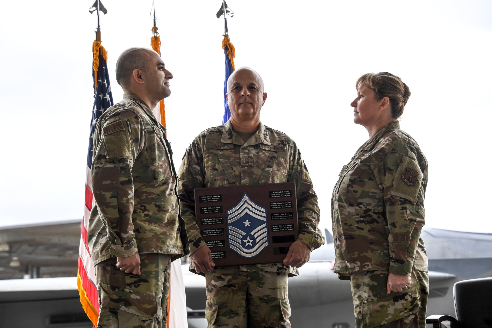 Chief Master Sgt. Lorene Kitzmiller accepts new responsibilities during an assumption of authority ceremony held at Fresno Air National Guard Base, California, as she becomes Command Chief of the 144th Fighter Wing Dec. 7, 2019