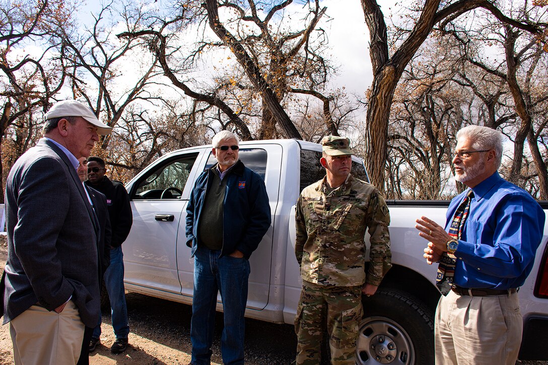 Albuquerque, N.M. -- R.D. James, assistant secretary of the Army for civil works, meets with local stakeholders at the Bernalillo to Belen levee during his visit, Jan. 22. (Left to right) James; Mike Hamman, chief executive officer, Middle Rio Grande Conservancy District; Lt. Col. Dale Caswell, commander, USACE-Albuquerque District; and Jerry Lovato, executive engineer, Albuquerque Metropolitan Arroyo Flood Control Authority.