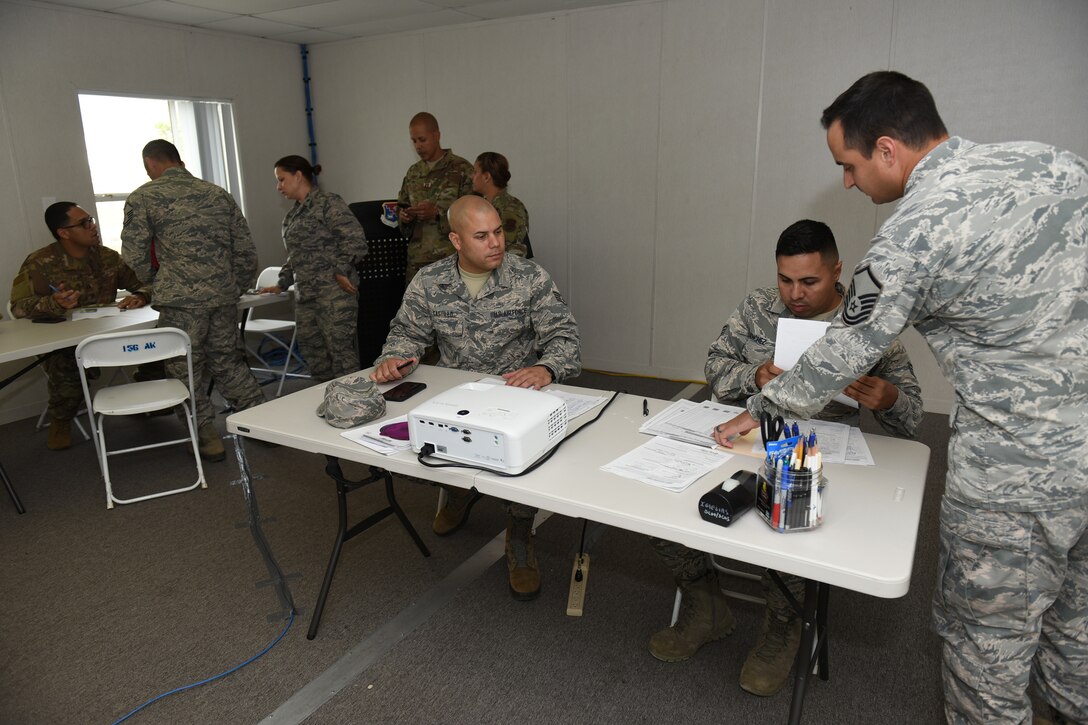 Puerto Rico Airmen process relief support from Ohio, New Mexico ANG