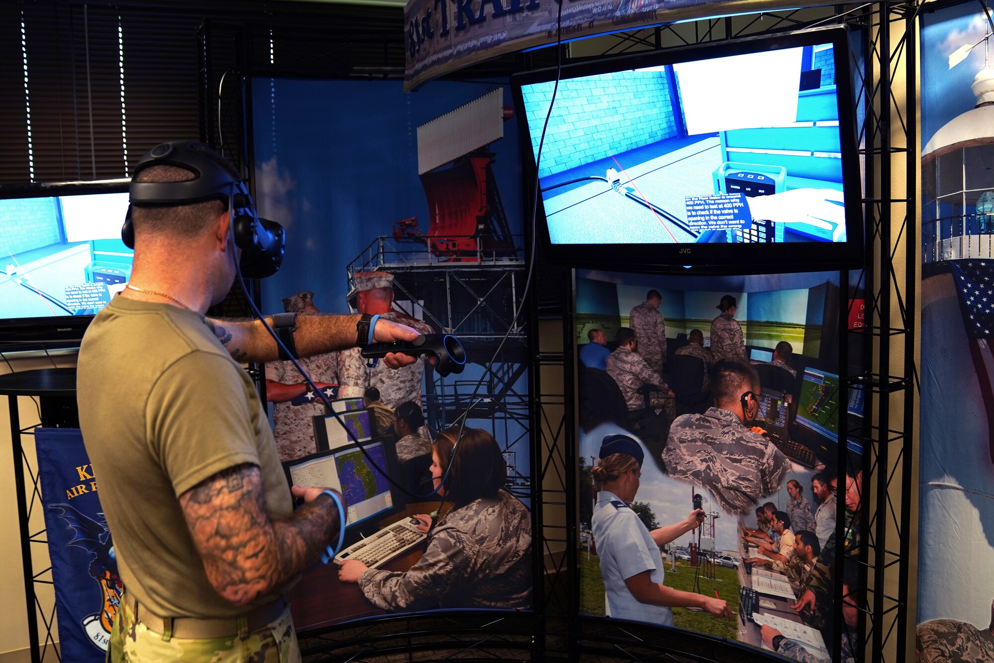 U.S. Air Force Master Sgt. Nathan Cyr, 335th Training Squadron Precision Measurement Equipment Laboratory career field training manager, tests new virtual reality technology inside the Trainer Development Center at Keesler Air Force Base, Mississippi, Jan. 16, 2020. The 335th TRS has introduced a new VR training experience to teach the students in the PMEL career field more efficiently. (U.S. Air Force photo by Airman 1st Class Seth Haddix)