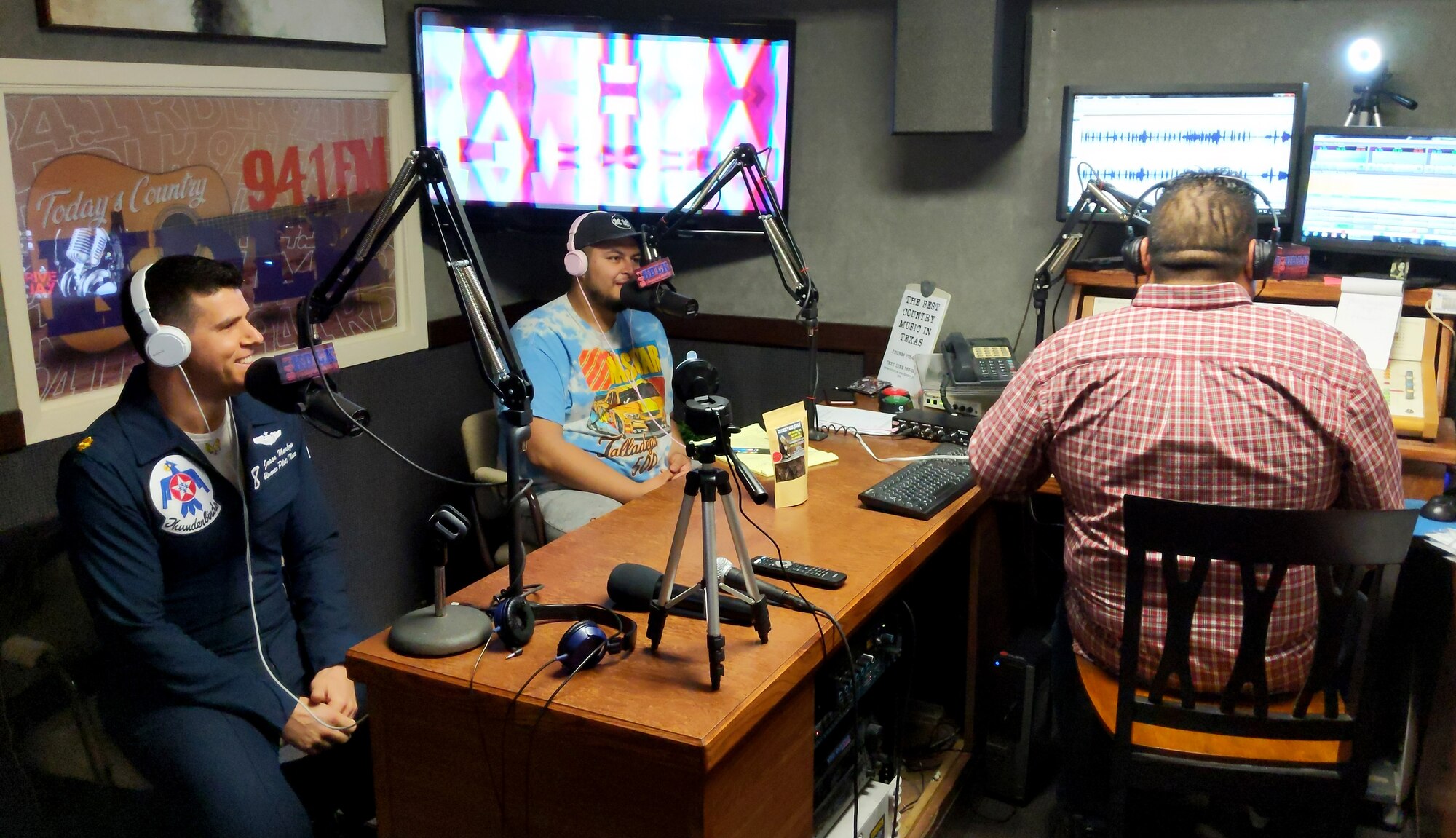 Maj. Jason Markzon, U.S. Air Force Aerial Demonstration Squadron, also known as the “Thunderbirds”, speaks with KDLK 94.1 FM hosts, during a radio broadcast in Del Rio, Texas on 24 Jan. 2020. Markzon visited Del Rio and Laughlin Air Force Base as part of the U.S. Air Force "Thunderbirds" advanced site survey to prepare for the 2020 'Fiesta of Flight' air & space expo on 14 March 2020. (U.S. Air Force photo by Senior Airman John A. Crawford)