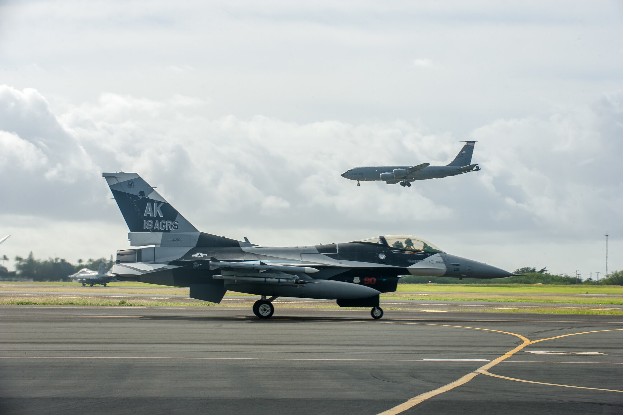 An F-16 Fighting Falcon, assigned to the 18th Aggressor Squadron, taxis down the flight line Jan. 17, 2020, at Joint Base Pearl Harbor-Hickam, Hawaii, during exercise Sentry Aloha 20-1. The Falcon, and other combat aircraft, received in-air refueling from KC-135 Stratotankers, from the 128th Air Refueling Wing, Wisconsin Air National Guard, throughout a series of dissimilar-air-combat-training missions. Sentry Aloha is a Hawaii Air National Guard-led exercise, which provides participants a multi-faceted, joint venue with supporting infrastructure and personnel. (U.S. Air National Guard photo by Senior Airman John Linzmeier)