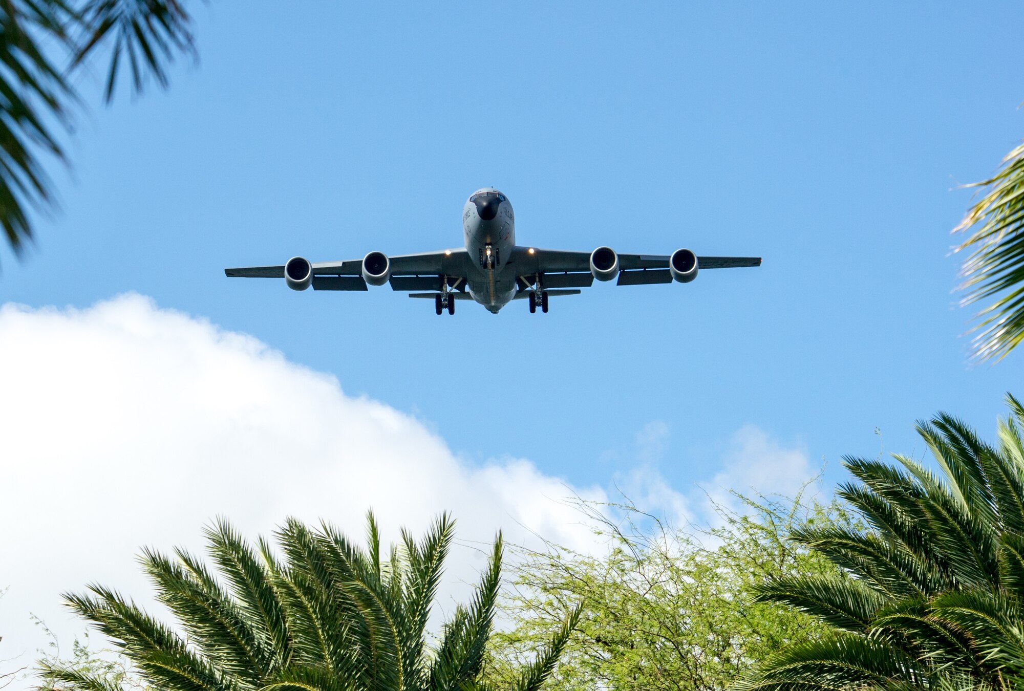 A KC-135 Stratotanker approaches Honolulu Airport