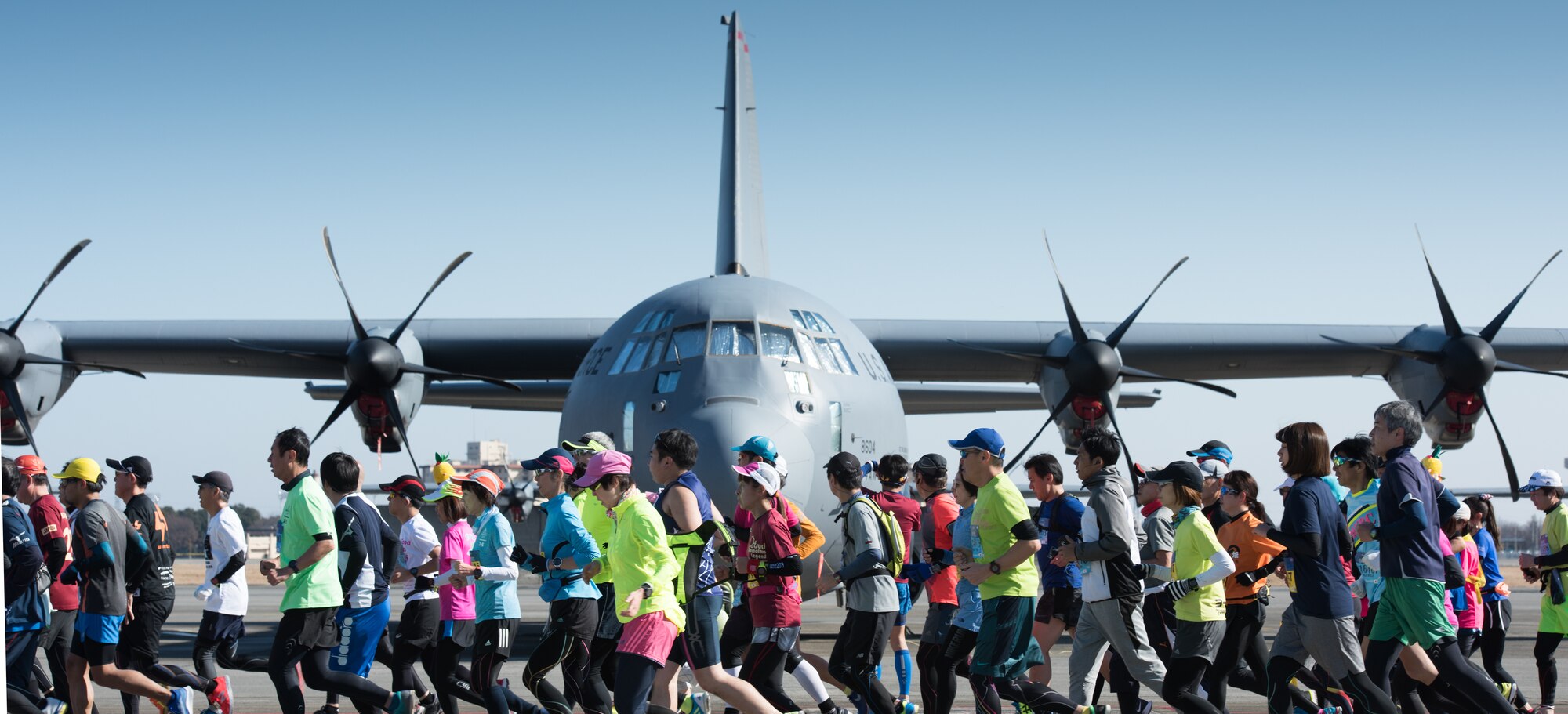 Athletes run in a half-marathon at Yokota Air Base
