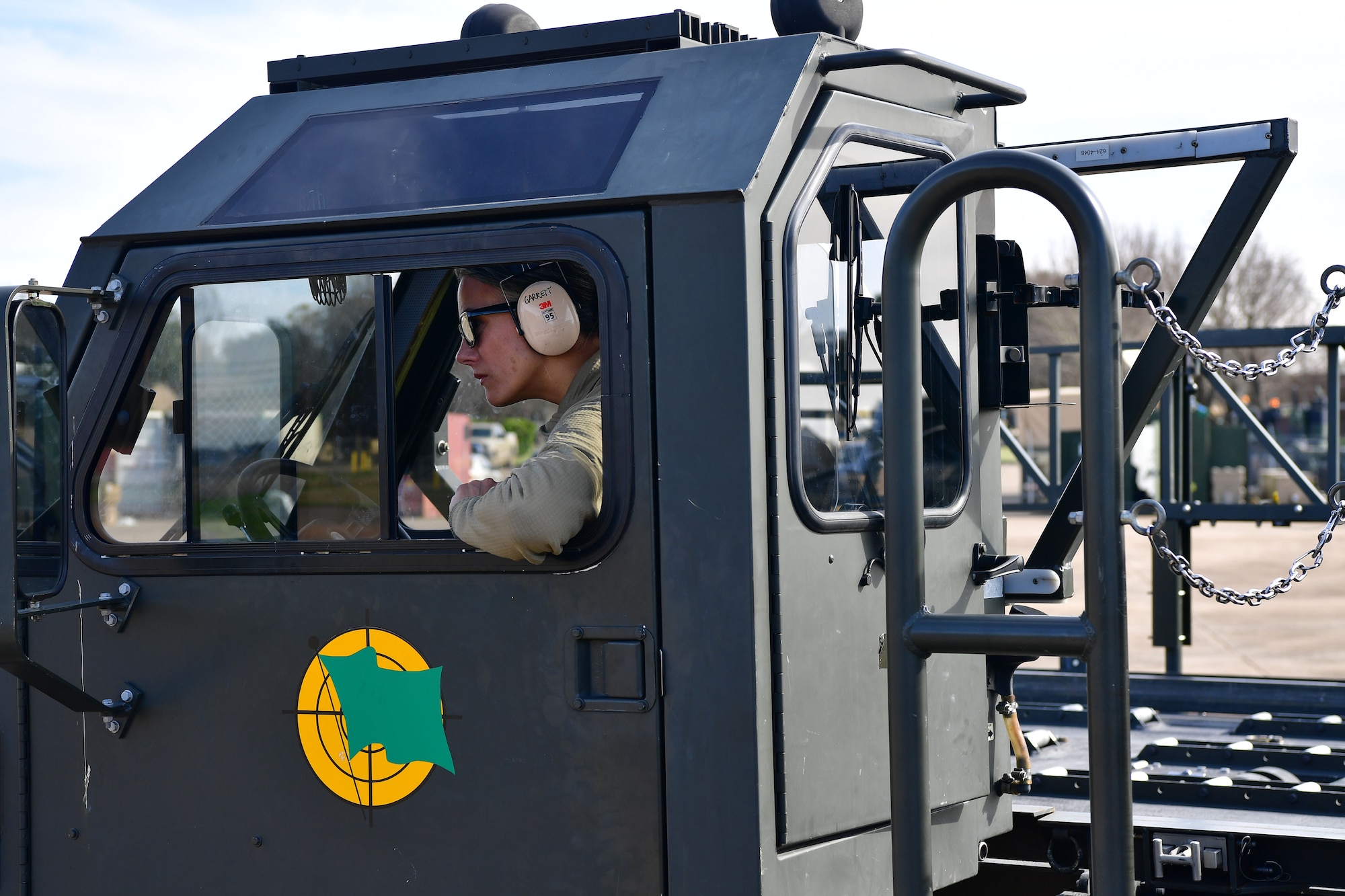 U.S. Air Force reservist Tech. Sgt. Kristen Garrett, 96th Aerial Port Squadron air transportation specialist, performs a maintenance check on a K-loader during Green Flag Little Rock 20-03.