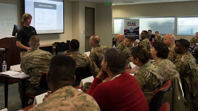 Dan Rini, the Rini Technologies president, presents a proposal for a personal cooling system to 6th Air Refueling Wing leadership, during MacDill Pitch Day Jan. 22, 2020, in Tampa, Fla.  MacDill Pitch Day provides an opportunity for MacDill Air Force Base to partner with small businesses to find solutions to challenges on base.