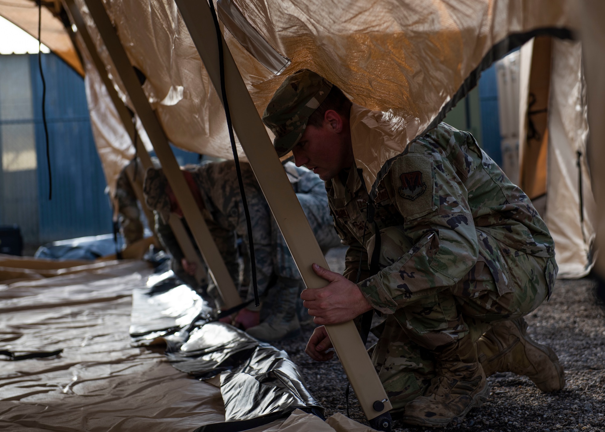 Airmen from the 366th Civil Engineer Squadron set up a Rapid Deployment Tactical Military Shelter during their multi-capable Airman training, Jan. 23, 2020, at Mountain Home Air Force Base, Idaho. The shelter is made of durable material and can withstand winds up to 60 mph. (U.S. Air Force photo by Senior Airman Tyrell Hall)