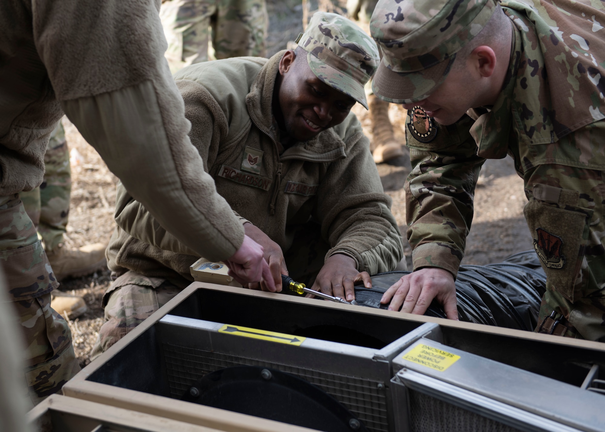 Staff Sgt. David Richardson, 366th Civil Engineer Squadron, learns how to assemble a heating, ventalation and air-conditioning unit during a multi-capable Airman training, Jan. 23, 2020, at Mountain Home Air Force Base, Idaho. This training was conducted to equip Airman with skills from other career fields to enhance their readiness. (U.S. Air Force photo by Senior Airman Tyrell Hall)