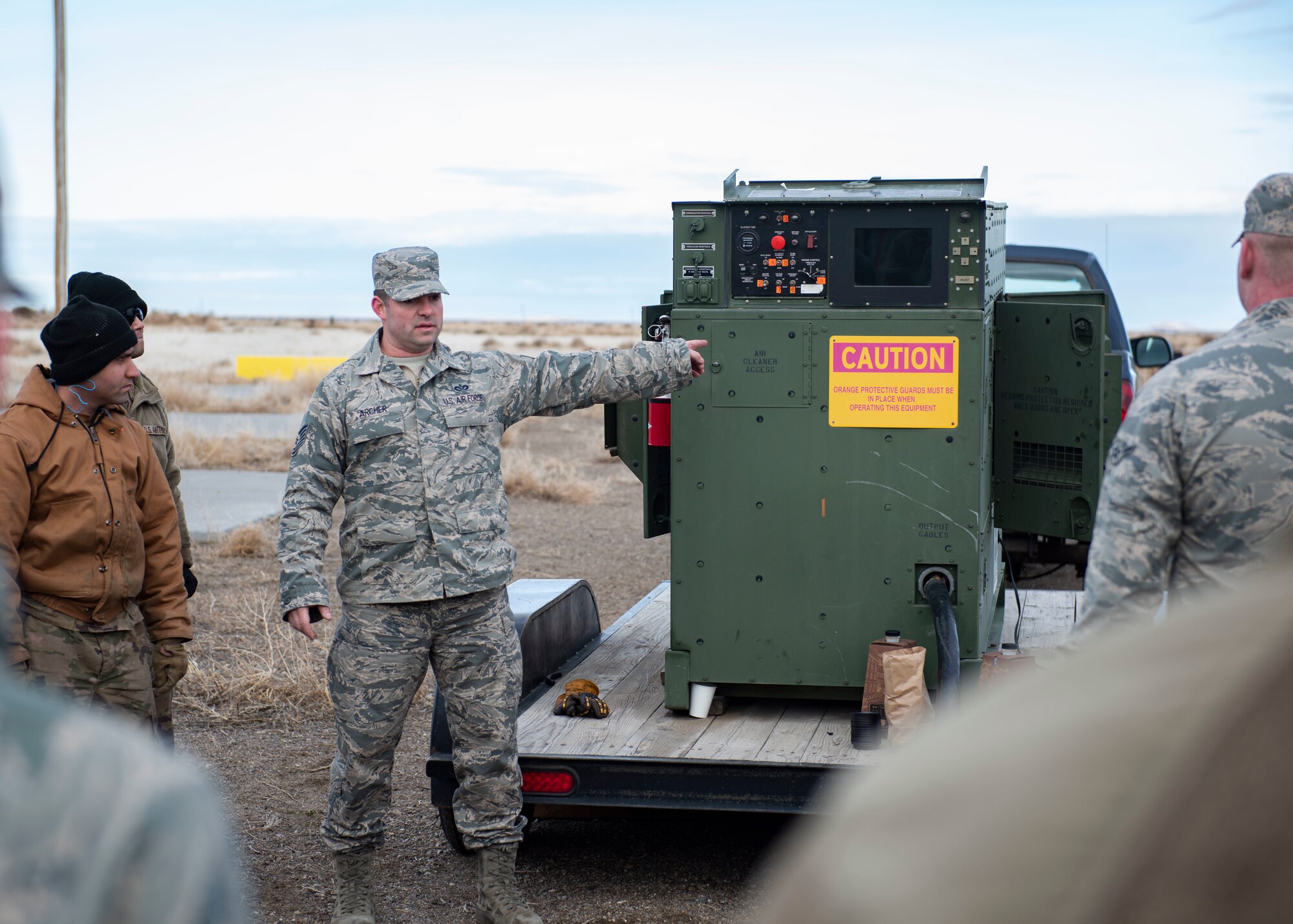 Tech. Sgt. Christopher Archer, 366th Civil Engineer Squadron electrical power production craftsman, teaches Airmen how to use a power generator during a multi-capable Airman training, Jan. 23, 2020, at Mountain Home Air Force Base, Idaho. This training was conducted to equip Airman with skills from other career fields to enhance their readiness. (U.S. Air Force photo by Senior Airman Tyrell Hall)