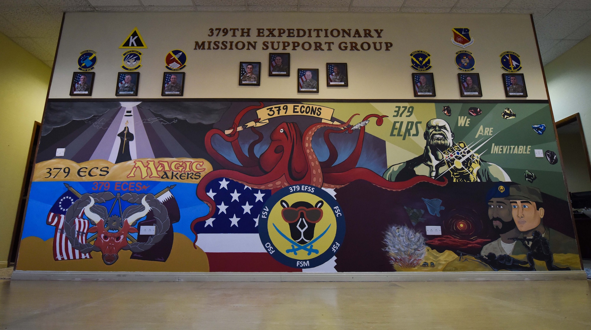 The finished mural is displayed in the 379th Expeditionary Mission Support Group building at Al Udeid Air Base, Qatar on Dec. 5, 2019. The 379th EMSG is comprised of six squadrons represented in different areas on the wall. (U.S. Air Force photo by Senior Airman Shay Stuart)