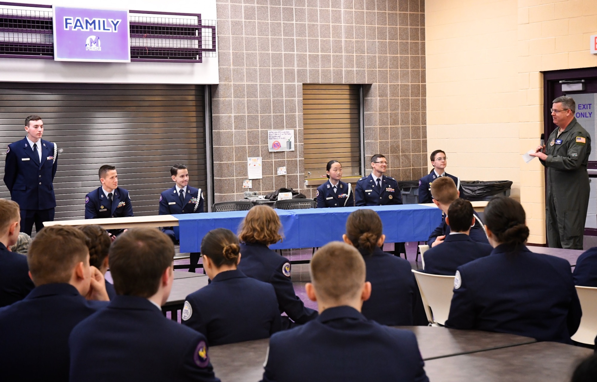 The commander of the 932nd Airlift Wing's Operations Group, Col. Michael Maloney, stopped by to visit the Mascoutah High School JROTC unit January 16, 2020.  This is a cadet corp the Air Force Reserve wing adopted several years ago.  Col. Maloney was the guest speaker at the JROTC commander's call held right after a change of command ceremony as a guests of JROTC instructor, Lt. Col. David Berthe, second from right at table.  Maloney spoke on leadership and the students asked questions about flying and military service.  ROTC stands for Junior Reserve Officer’s Training Corps. It is a military-regulated program designed to offer high school students leadership experiences and motivate them to become better American citizens. JROTC combines classroom instruction with service to school and community, extracurricular and social activities and the chance to take on leadership roles.  The 932nd Airlift Wing is a 22nd Air Force unit located at Scott Air Force Base, Ill. (U.S. Air Force photo by Lt. Col. Stan Paregien)